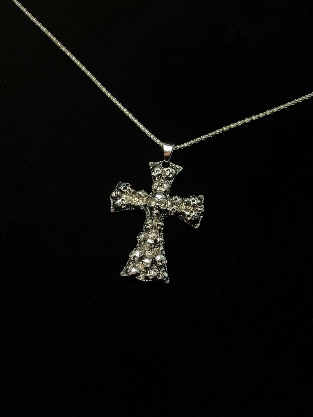 skull ruins cross